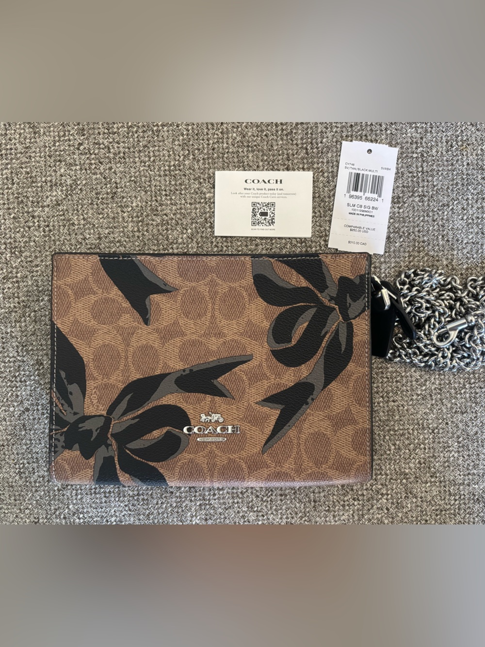 Coach Slim Crossbody Brown Signature Canvas Wallet with Black Bow Print